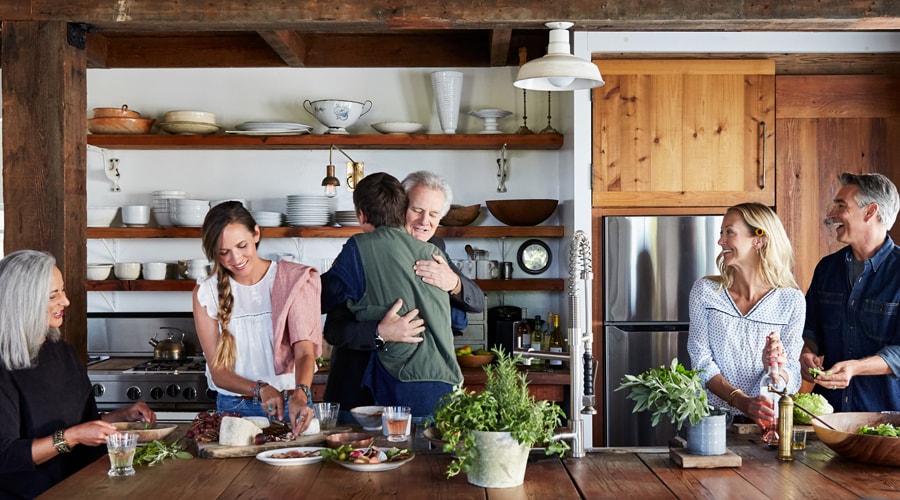 A family getting together for dinner on vacation.