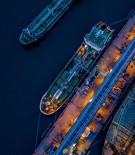 View of ships at night from above.