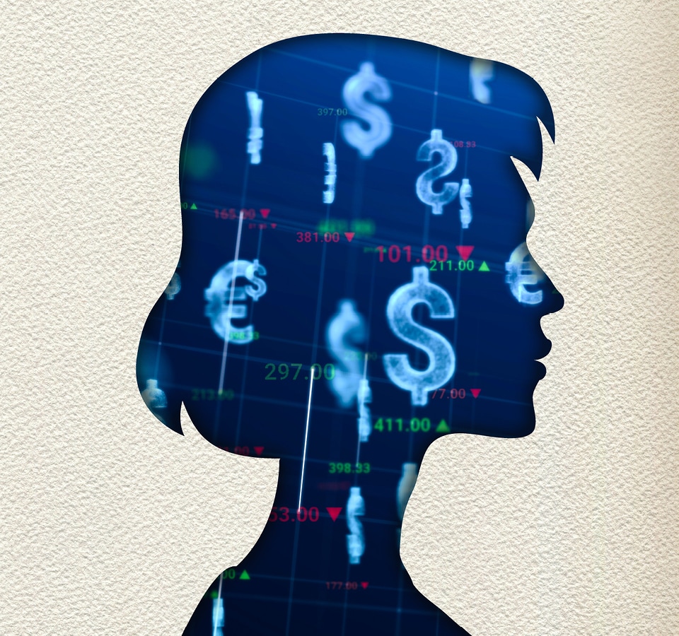 Cutout silhouette of woman and financial models