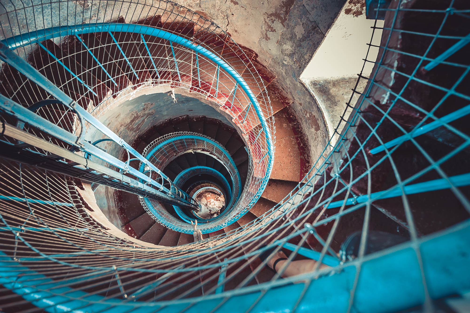 Aerial view teal industrial spiral staircase