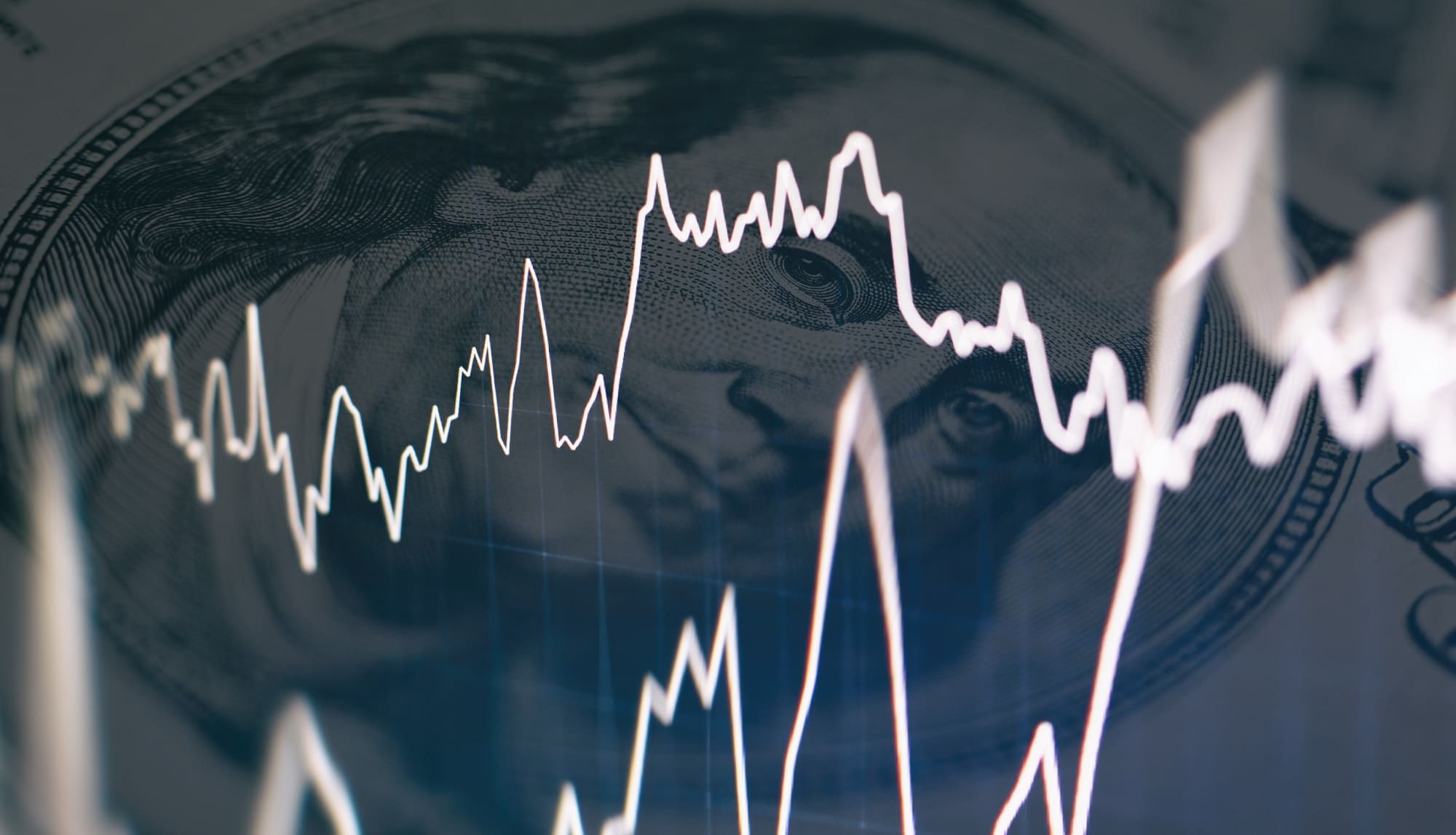 Ben Franklin looks through market mountain graphs