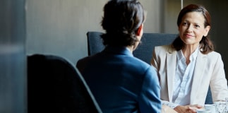 Woman meeting with a client.