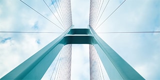 Looking up at the bridge towers